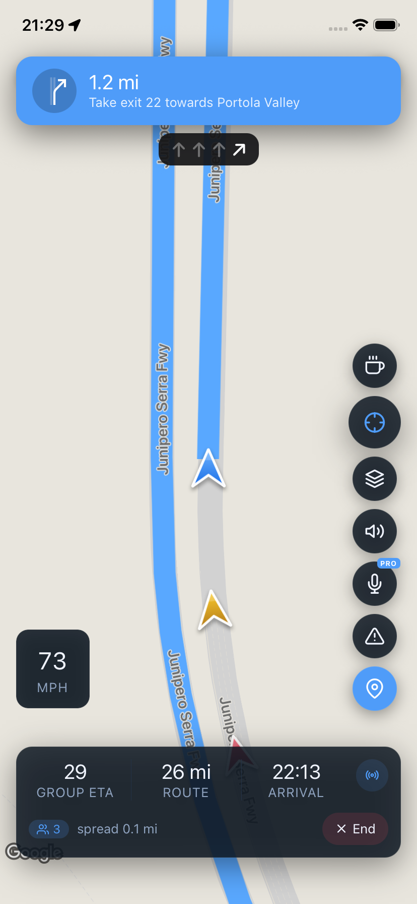 Live convoy navigation showing multiple members on the route with a motorway exit instruction and a shared group arrival time